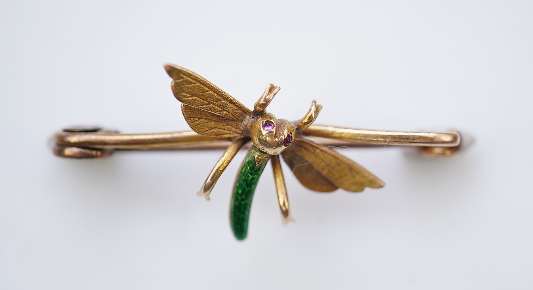 A gold and enamel brooch, early 20th century